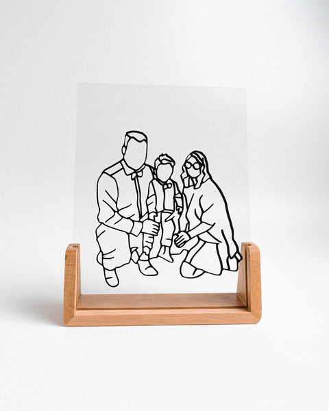 lijntekening gegraveerd uit hout op transparant plexiglas