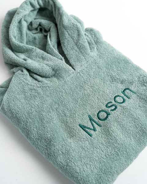 gepersonaliseerde poncho met naam geborduurd