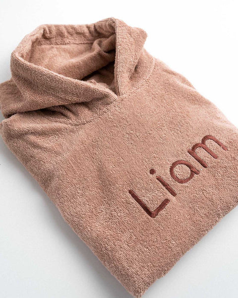 gepersonaliseerde poncho met naam geborduurd