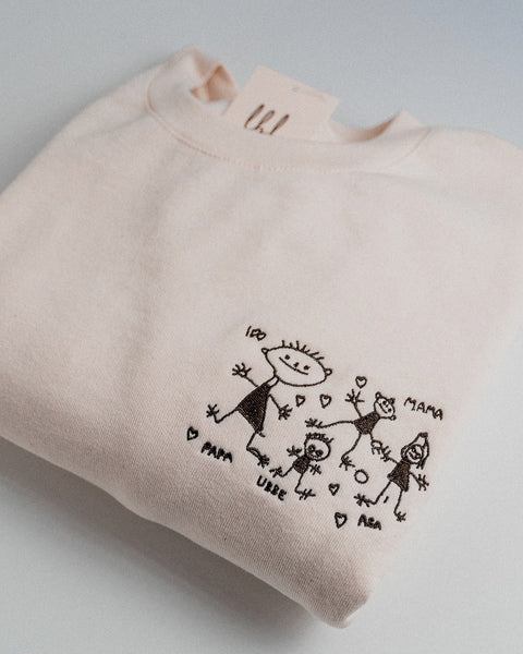 Pull avec dessin d'enfant